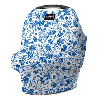 The Milk Snob Cover Disneys Stitch is multifunctional with a white background, featuring blue jungle-themed illustrations of monkeys, leaves, and cocoa pods. It doubles as a nursing cover and includes a small black label displaying the brand name Milk Snob at the top.