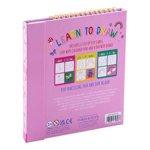 Pink Learn to Draw, Rainbow Fairy set by Floss and Rock for ages 3+, includes steps, wipe-clean pens, board; made with eco-friendly materials.