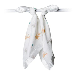 The white Security Blanket, Little Fawn by Lulujo Inc., is a breathable muslin with colorful animal prints, tied elegantly at the top.