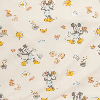 Magnetic Mes Magnetic Coverall, Mickeys Brunch Bunch, features pastel mice, suns, and cereal bowls on eco-friendly TENCEL™ modal.