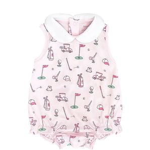 Noomies pink golf bubble romper with white collar features golf-themed illustrations and is made from soft Pima cotton.