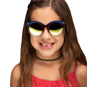 A girl with long brown hair wearing DC Wonder Woman Arkaid Sunglasses by Sunstaches, a black choker, and a red top smiles toothlessly.