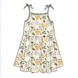 Illustration of Emerson and Friends Sundress in Happy Honey Bees pattern with green, white, gold tones and bow straps.