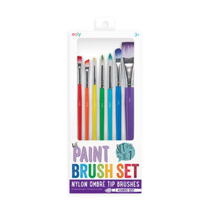 OOLYs Lil Paint Brush Set includes six easy-to-clean, nylon ombré brushes in various sizes, ideal for watercolors, in a clear box.