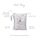 Bumkins Wet Bag: Floral, 12x14, waterproof fabric, zipper closure, snap handle. Text: Wet Bag.