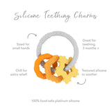 Bumkins Silicone Teething Charms in orange offer optimal relief with textured, food-safe silicone surfaces.