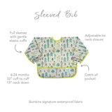 Bumkins Sleeved Bib: Cacti - Waterproof, full sleeves with elastic cuffs, adjustable fit, front pocket; cactus and llama pattern.