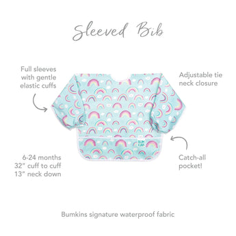 The Sleeved Bib: Rainbows by Bumkins is mint green with a rainbow print, tie neck, elastic cuffs, catch pocket, stain-resistant. For 6-24 months.