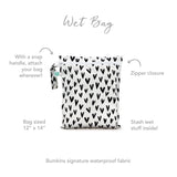 Bumkins Wet Bag: Hearts, white with black hearts, snap handle, zipper closure, waterproof fabric, size 12 x 14.