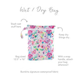 The Watercolor Wet/Dry Bag by Bumkins features a snap handle, dual compartments, & waterproof fabric. Size: 12.5x16.