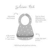 Bumkins Silicone Bib: Hearts, gray with white hearts, adjustable neck, catch-all pocket. Food-safe silicone for ages 6-24 months.