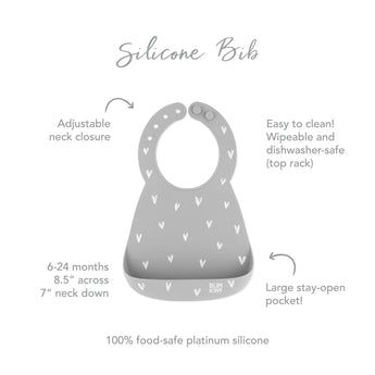 Bumkins Silicone Bib: Hearts, gray with white hearts, adjustable neck, catch-all pocket. Food-safe silicone for ages 6-24 months.