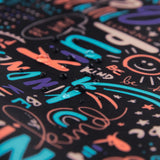 Close-up of colorful abstract art with words and doodles in orange, blue, and teal, like vibrant Bumkins Clear Travel Bag 3-Pack.