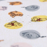 Close-up of waterproof Winnie and Friends Splat Mat by Bumkins, featuring cartoon animals like bears and pigs for easy cleaning.