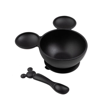 Part of Bumkins Disney Black + White Collection, the Silicone Feeding Set features a Mickey Mouse head shape in classic black.