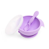 Bumkins Silicone First Feeding Set: Lavender includes a bowl with suction base, matching spoon, and clear lid; perfect for beginners.