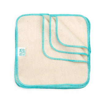 The Flannel Wipes 12 Pack by Bumkins features a beige cotton cloth with turquoise trim and label, folded in layers.