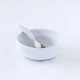 The Bumkins Silicone Grip Bowl: Marble is perfect for self-feeding toddlers, with a spoon included for easy use.