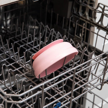 Silicone Grip Bowl: Pink by Bumkins, fits over dishwasher tines in top rack.