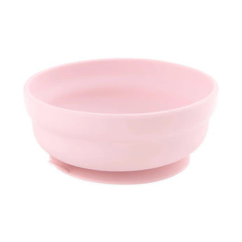 The Bumkins Silicone Grip Bowl in pastel pink offers a smooth, round shape with a flat base and is crafted from food-safe platinum silicone, making it perfect for baby feeding or food storage.