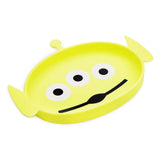 Bumkins Silicone Grip Dish: Toy Story Alien with three eyes and pointy ears, perfect for toddlers learning to self-feed. Bright yellow.