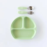 The Bumkins Sage Silicone Grip Dish set, with matching spoon and fork, is ideal for toddler feeding on any food-safe silicone surface.