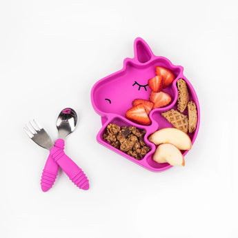 The Unicorn Silicone Grip Dish by Bumkins comes with strawberries, apples, waffles, granola & a pink toddler spoon and fork set.