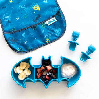 Bumkins Batman Blue Silicone Grip Dish holds banana slices, berries, yogurt. Includes blue fork & spoon for delightful toddler dining.