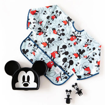 Bumkins Disney Little Ones Gift Bundle: Mickey Mouse Classic includes a bib, Chewtensils®, and a Mickey-shaped Grip Dish.