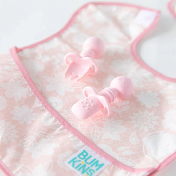 The Ultimate Gift Set - Floral & Lace by Bumkins features a pink baby bib and utensils, pairing perfectly with our Chewtensils.