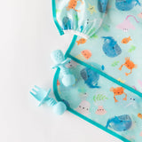 The Ultimate Gift Set by Bumkins includes ocean-themed bibs and a light blue baby fork and spoon for easy self-feeding.