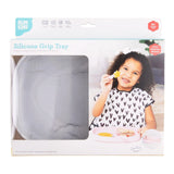 The Bumkins Silicone Grip Tray: Marble is shown on packaging with a smiling child wearing a heart-patterned shirt, joyfully holding food.