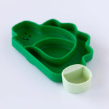 Bumkins Silicone Little Dipper Gumdrop is a green, dino-shaped plate with compartments and smiley design, plus a small safety-tested cup.