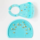 Bumkins Silicone Sensory Placemat in blue is a turquoise bib and feeding mat set with colorful animal illustrations.