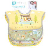 The Bumkins SuperBib® 3 Pack: Happy Campers is perfect for little adventurers, featuring camping-themed designs with animals, a camper van, and trees on a yellow backdrop. Made from waterproof fabric for easy cleaning, these bibs are ideal for explorers aged 6-24 months.