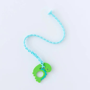 Bumkins Silicone Accessory Tether 2-Pack: Blue features a green dinosaur-shaped teether perfect for sensory exploration.