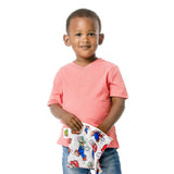 A young boy in a coral shirt and jeans holds a Bumkins Super Mario™ & Luigi reusable snack bag.