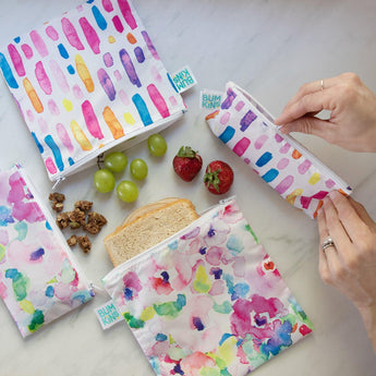 Bumkins Large Reusable Snack Bags feature watercolor patterns and a zippered closure, perfect for sandwiches, grapes, strawberries, and nuts.