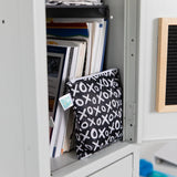 Open locker with books, papers, and a black/white XOXO-patterned bag plus Bumkins reusable snack bags in XOXO & Hearts styles.