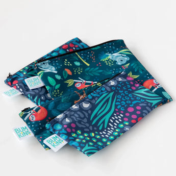 The Bumkins Reusable Snack Bag 2-Pack includes jungle and animal prints with waterproof fabric. Machine washable.