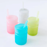 A set of four pastel-colored Bumkins Silicone Straw Cups with lids, arranged in a semi-circle on a white background.