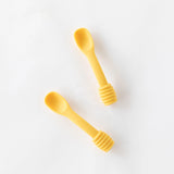 The Bumkins Silicone Dipping Spoons: Winnie the Pooh set includes two ribbed-handled spoons, perfect for self-feeding.