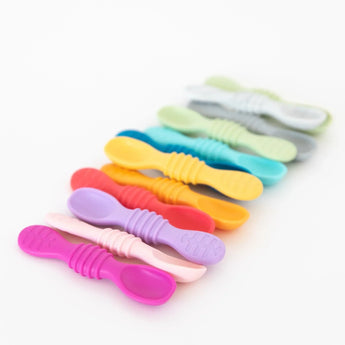 Bumkins Silicone Dipping Spoons 3 Pack: Lollipop in pink, orange, yellow, green, and blue for fun self-feeding on a white backdrop.