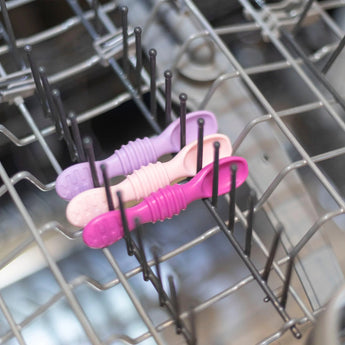 Bumkins Lollipop Silicone Dipping Spoons 3 Pack are ready on the top rack of the dishwasher for babys self-feeding.