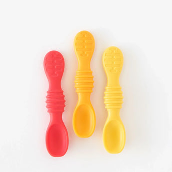 Bumkins Silicone Dipping Spoons 3 Pack: Tutti-Frutti includes one red and two yellow spoons, crafted with food-safe silicone and textured handles.