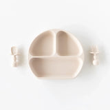 Beige Bumkins Silicone Chewtensils®: Sand, ideal for baby-led weaning, crafted from food-safe silicone on a white backdrop.