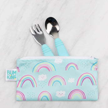 The Bumkins Spoon + Fork: Blue set, with a rainbow pouch, lies on marble, featuring stainless steel utensils and blue handles.