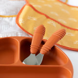 Bumkins Spoon + Fork: Clay toddler set with a divided plate and eye-design yellow bib, ideal for self-feeding.