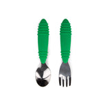 Bumkins Spoon + Fork: Jade features toddler utensils with green handles, perfect for self-feeding on a white backdrop.