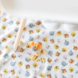 Bumkins’ Splat Mat: Winnie and Friends features playful animal patterns and waterproof fabric, perfect for easy cleanup.